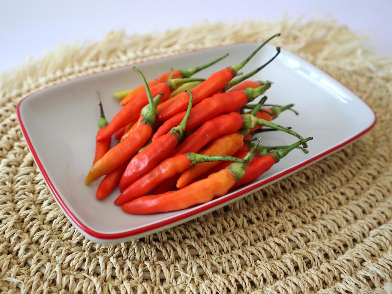 hot red chili in a rectangular plate. photo