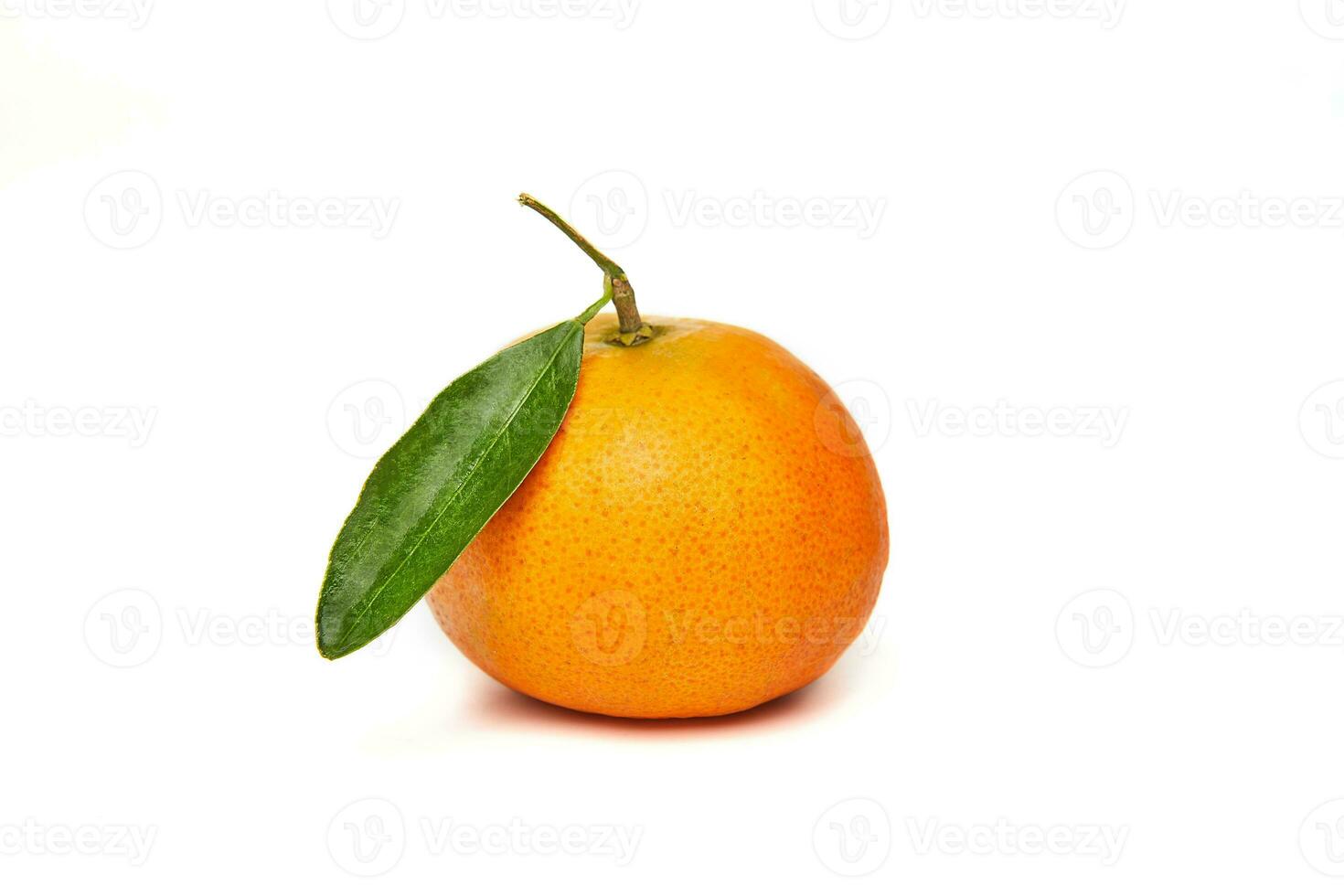 Fresh tangerine with green leaf isolated on white background photo