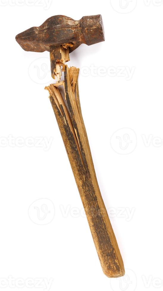 Old hammer and a broken handle isolated on a white background. photo
