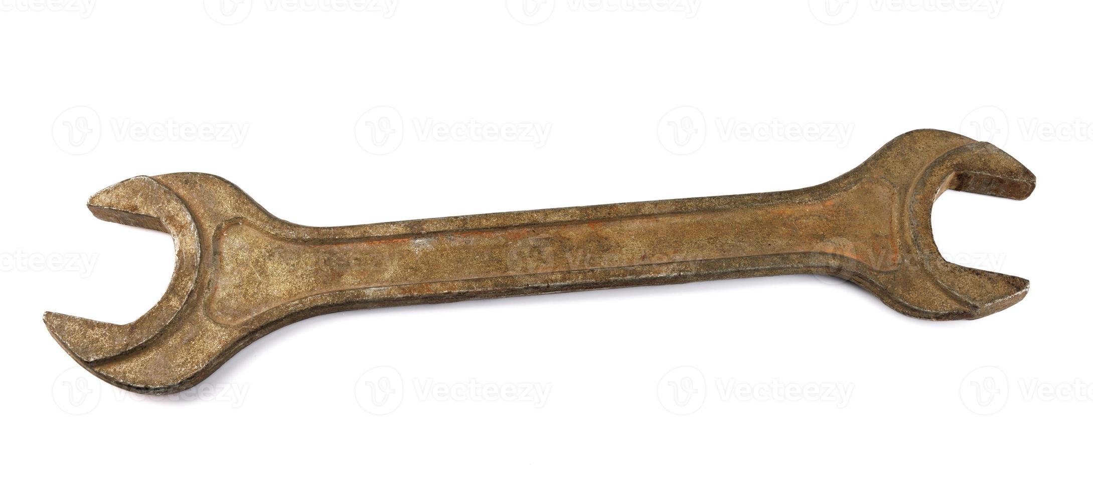 Old wrench isolated on white background. rusty wrench. photo