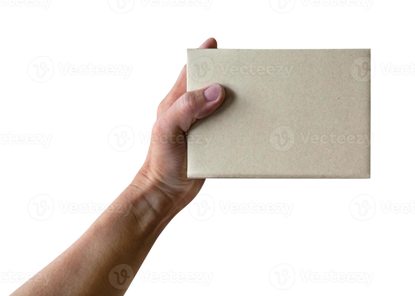 Hand holding paper box give gift isolated on white background,clipping path photo