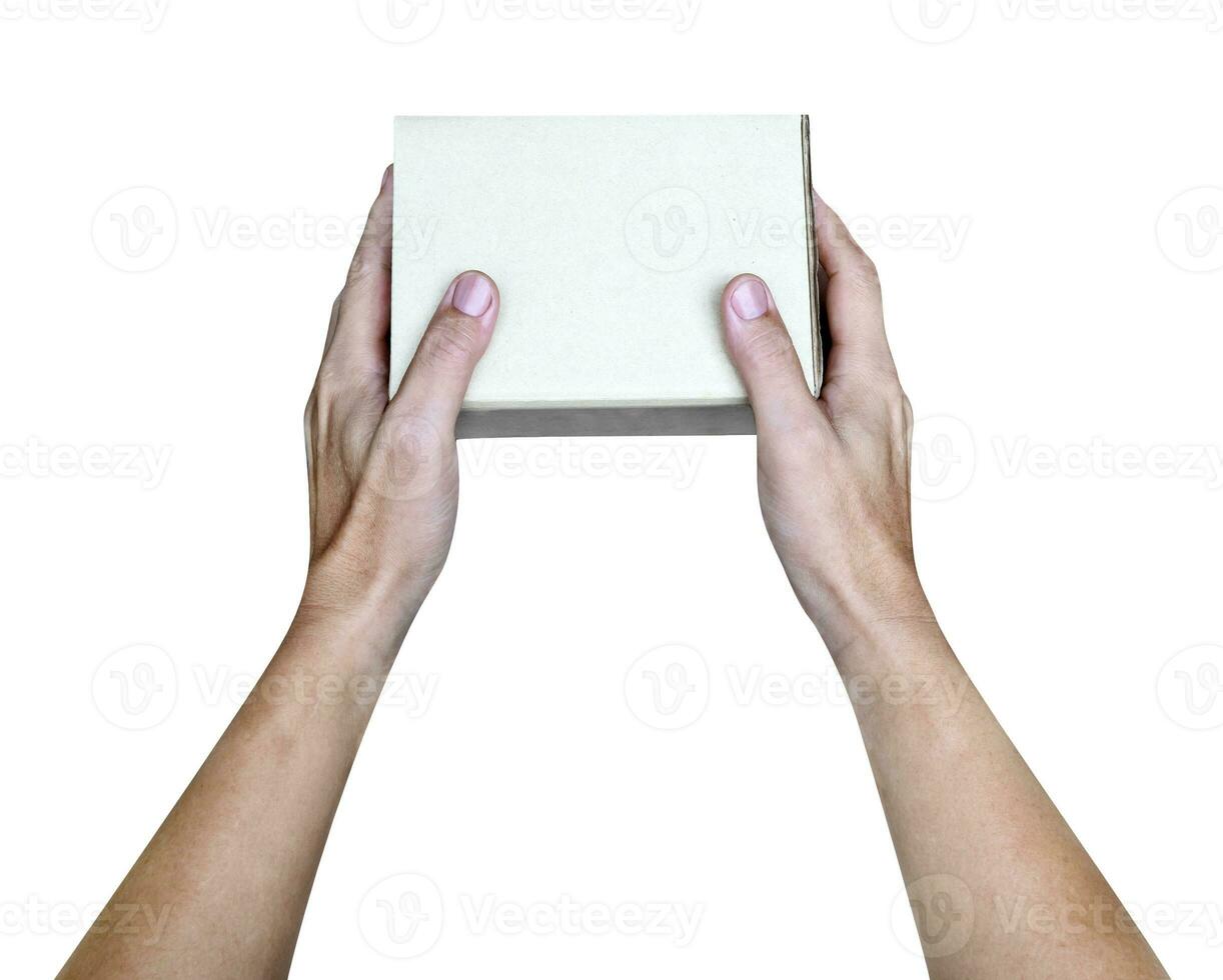 Hand holding paper box give gift isolated on white background,clipping path photo