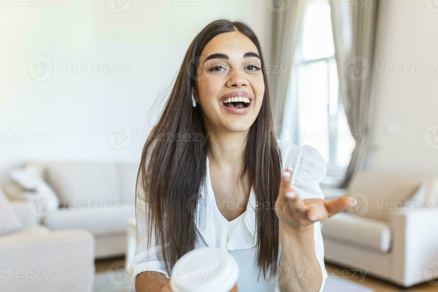 Headshot portrait screen view of smiling young woman sit at home talk on video call with friend or relative, happy young woman speaking online using Webcam conference on computer photo