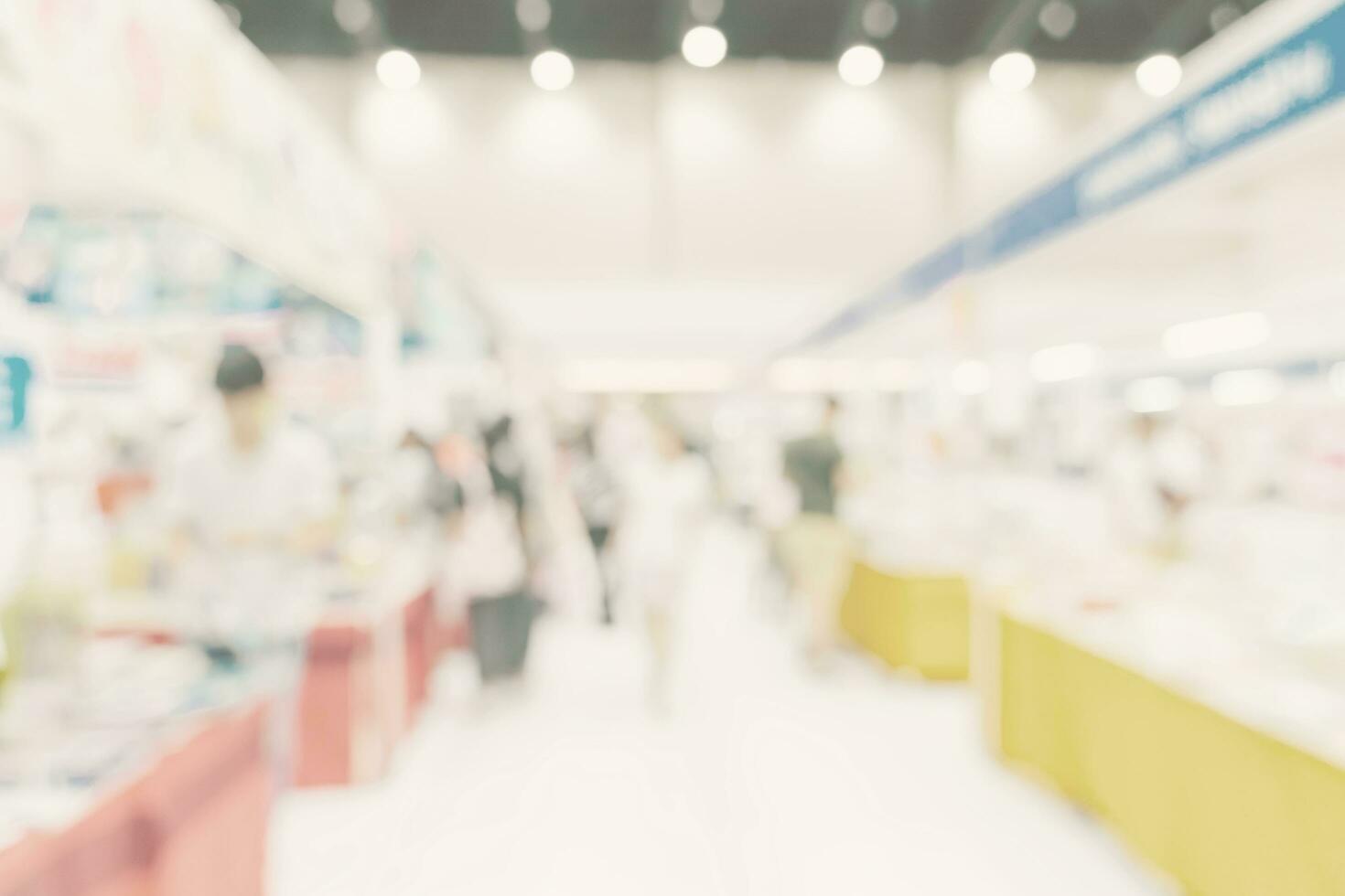 Abstract blur background crowd people in shopping mall for background, Vintage toned. photo