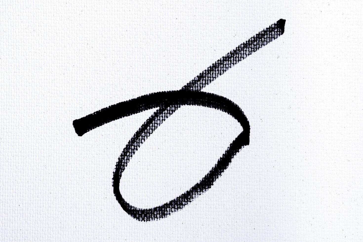 black ink shape on watercolor paper texture background photo