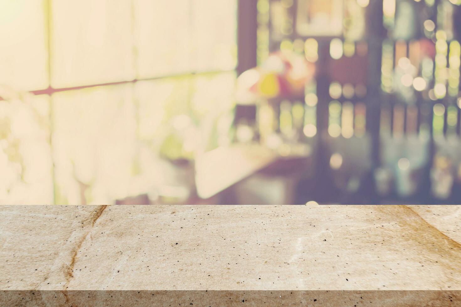 Empty stone marble and Blurred background  Coffee shop blur background bokeh with space display montage for product. photo