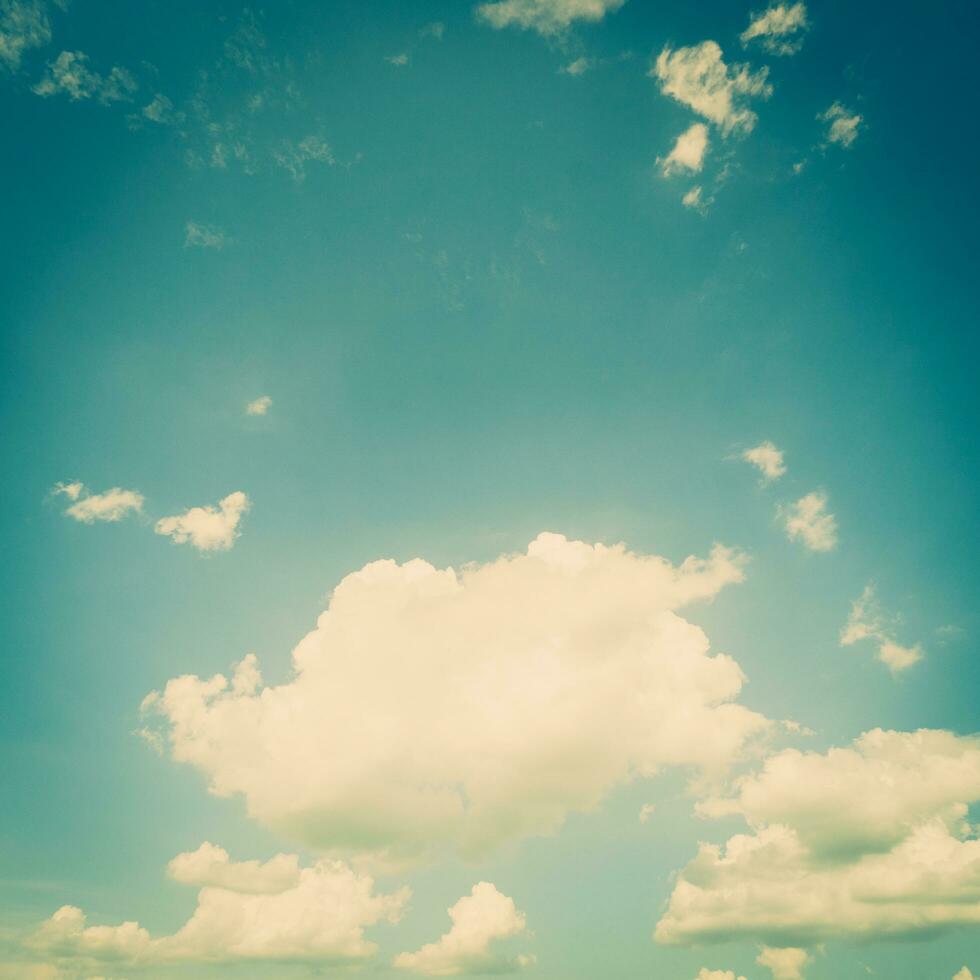 white clouds and blue sky vintage effect. photo