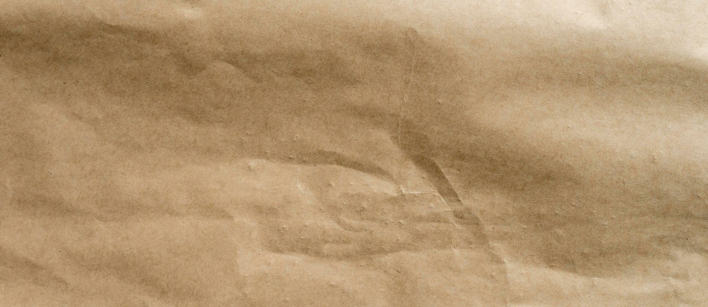 crumpled brown paper background and texture with copy  space. photo