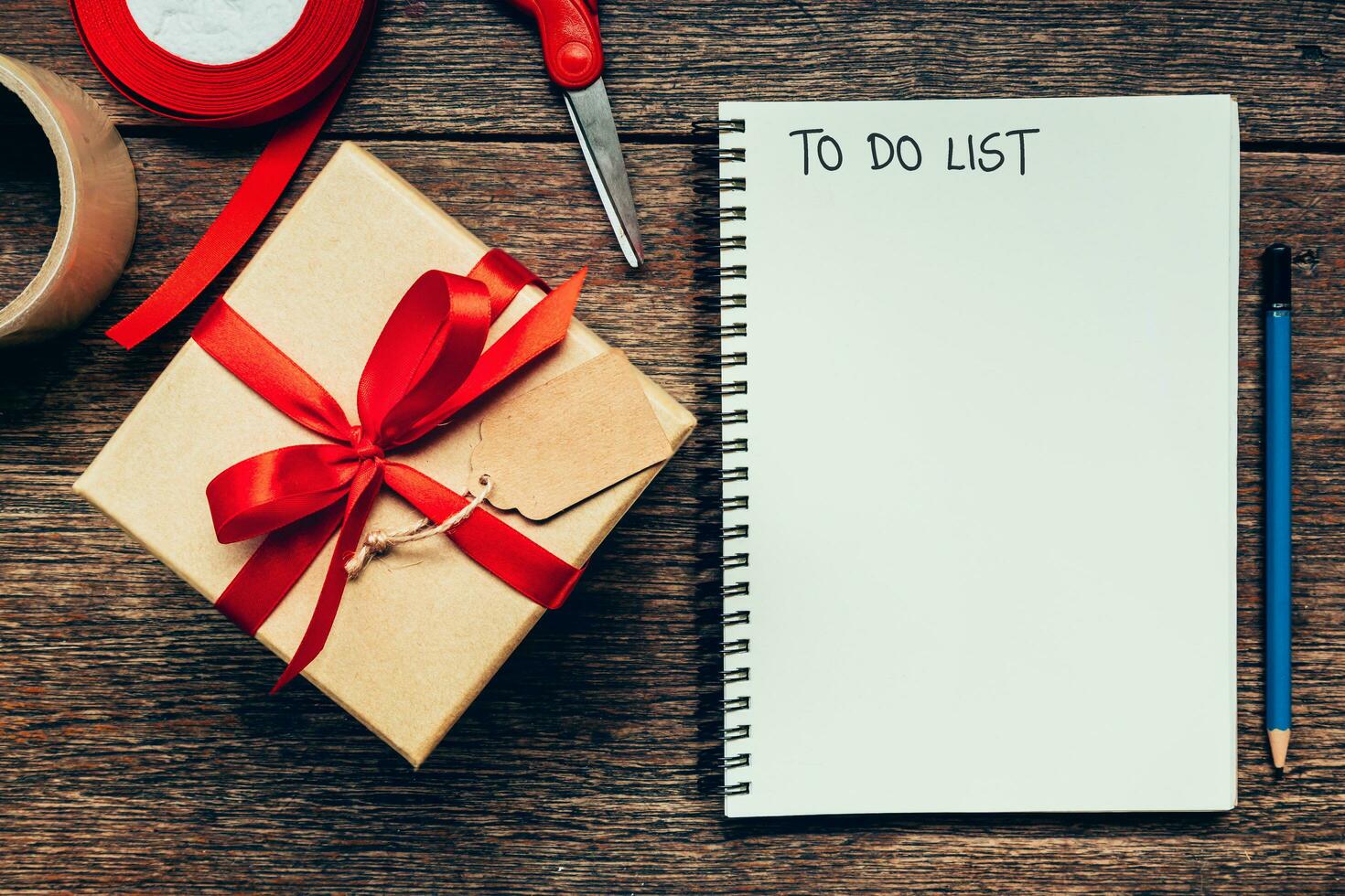 To Do List on note book on wood table background with space. photo