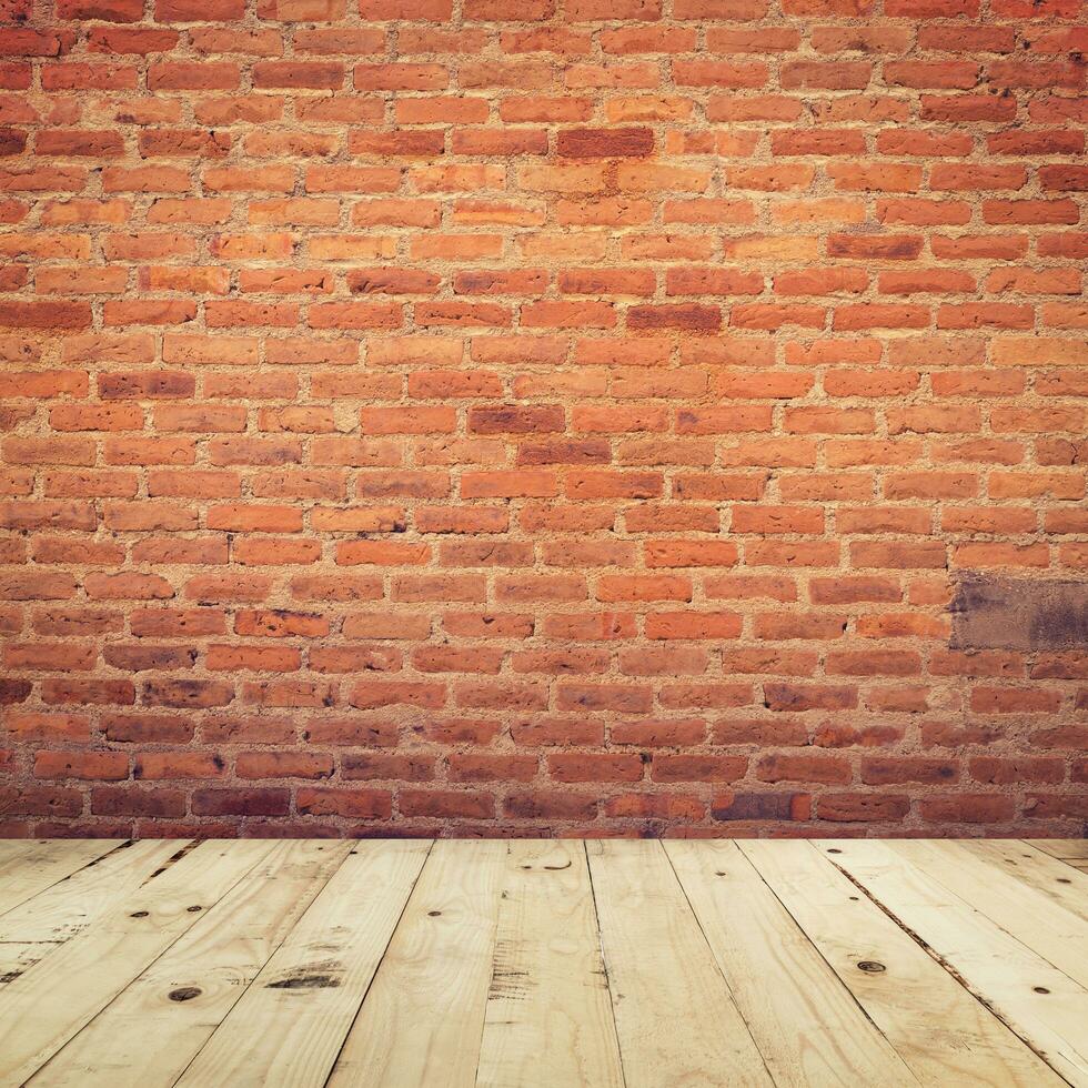 antiguo ladrillo pared y de madera piso habitación antecedentes textura. foto