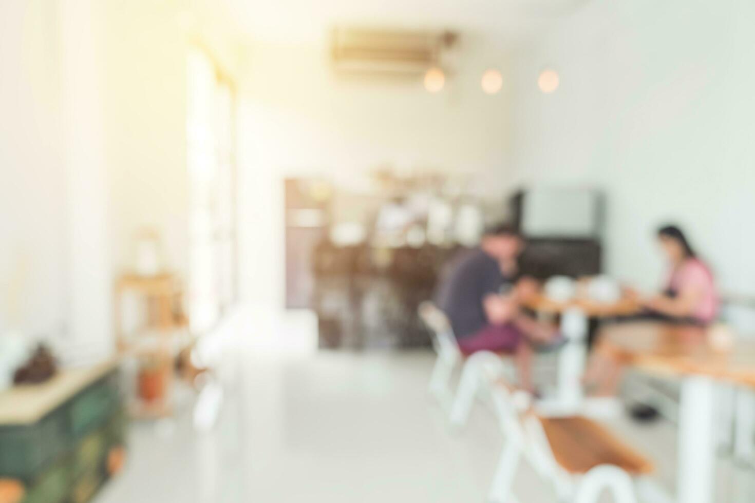 Blurred background  Customer at coffee shop blur background with bokeh, Vintage toned. photo