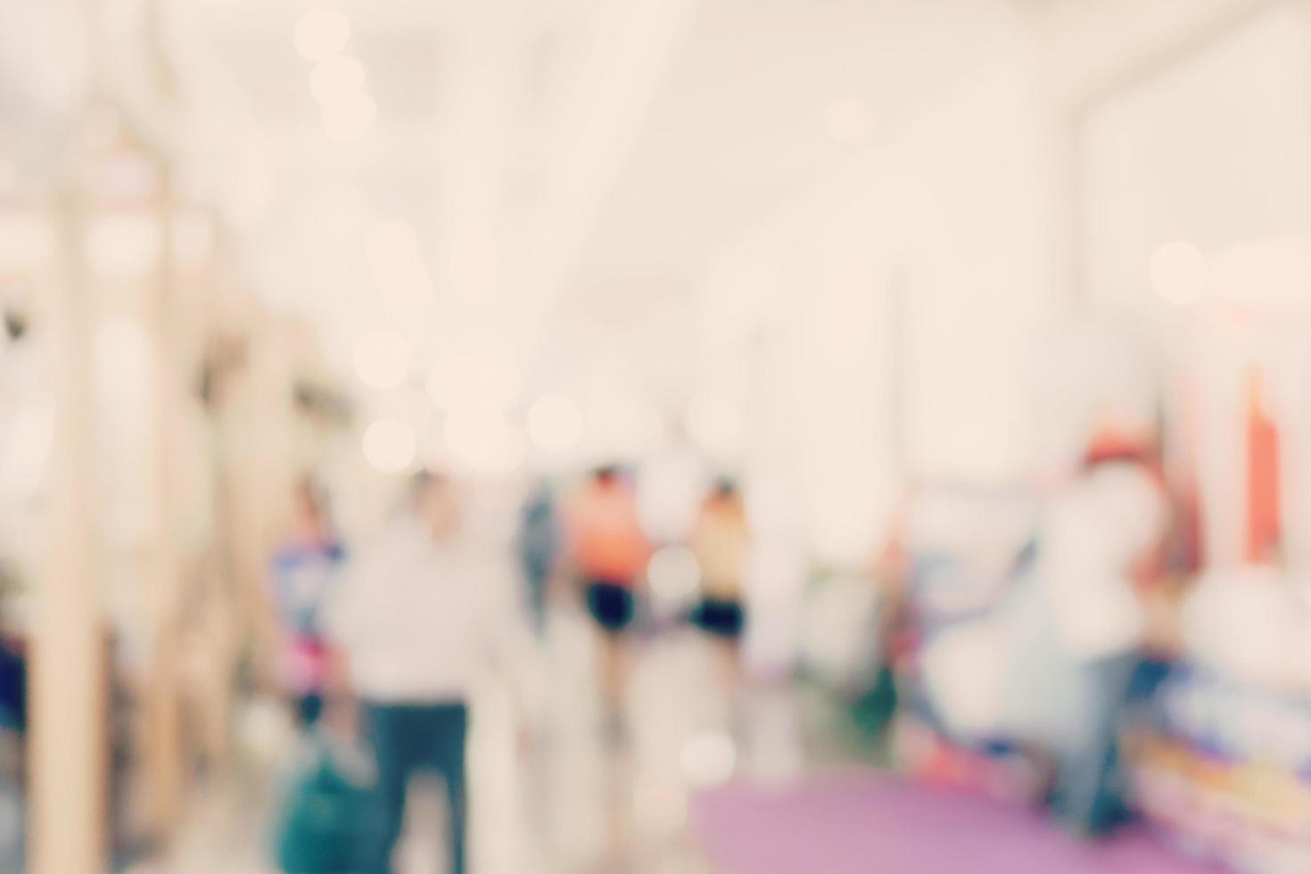 Blur image background of people in exhibition show. photo