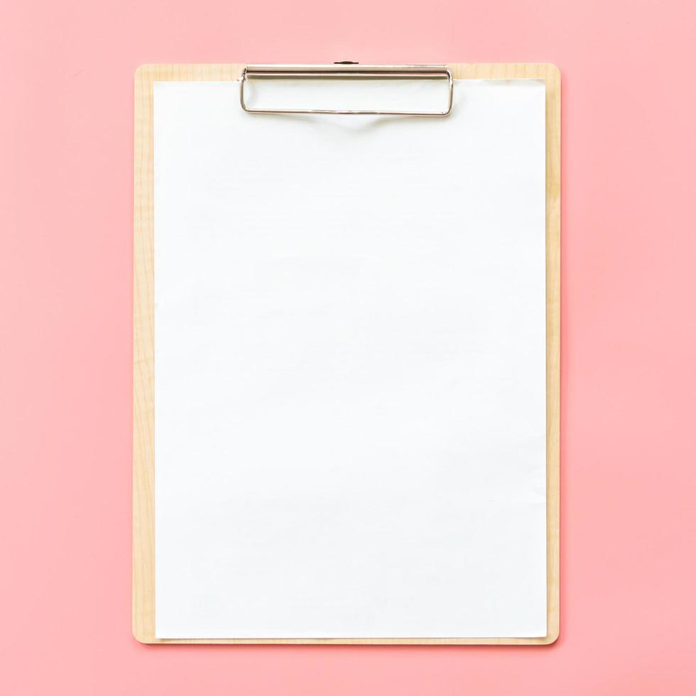 Blank clipboard mock up on pink pastel color background photo
