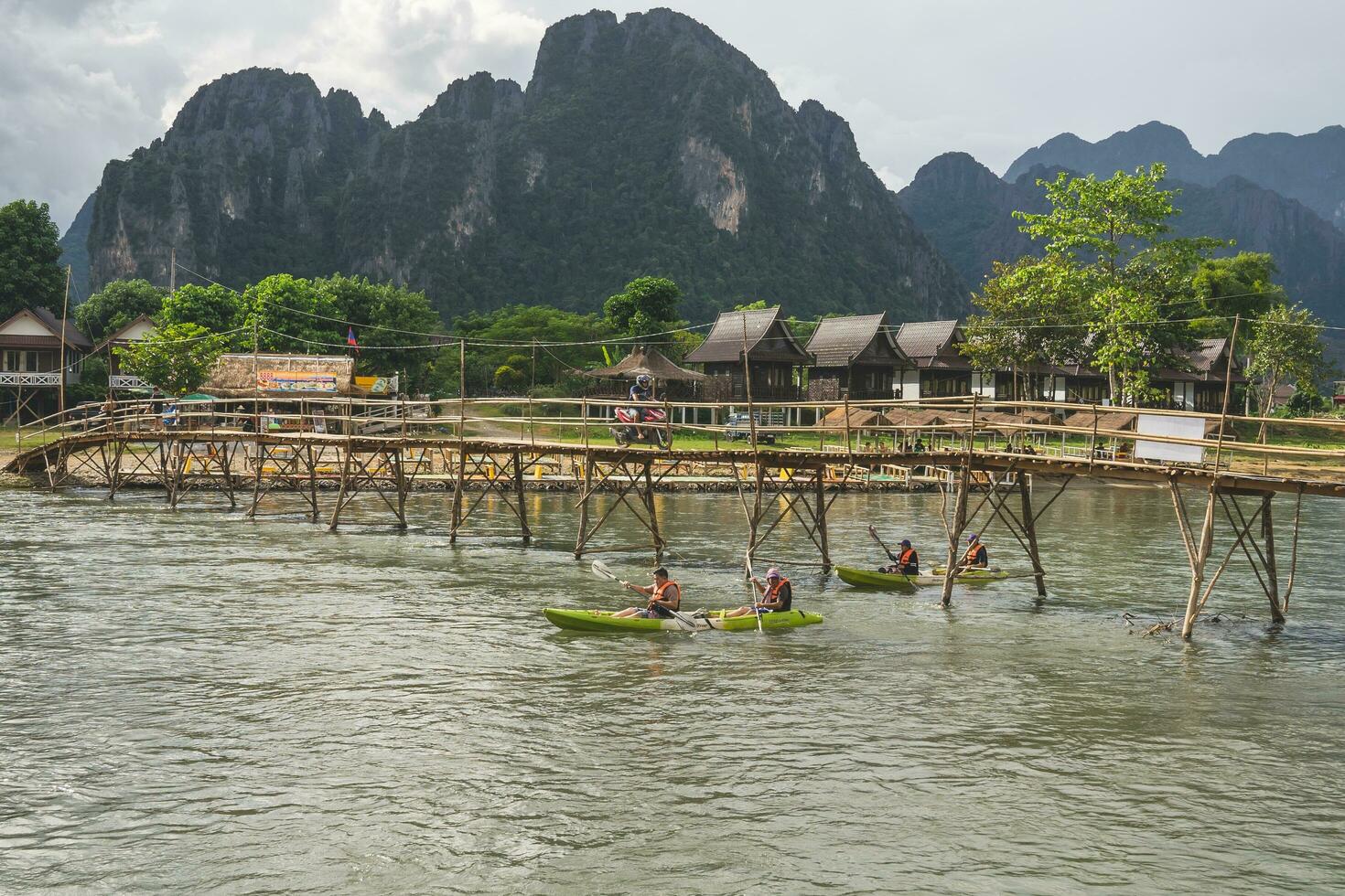 Colorful boat and tourism in Vang Vieng Laos photo