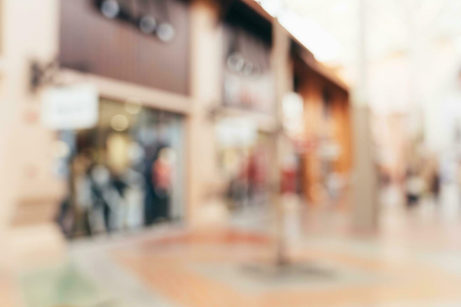 Vintage tone blurred defocused day of crowd people in walking street festival and shopping mall. photo
