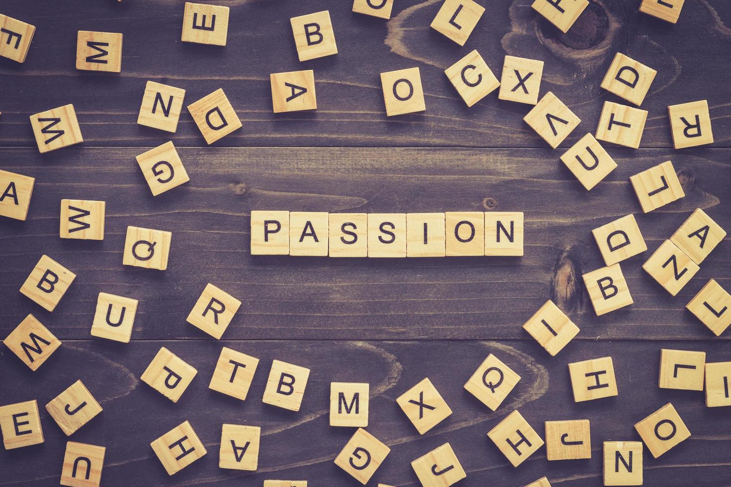 Passion word wood block on table for business concept. photo