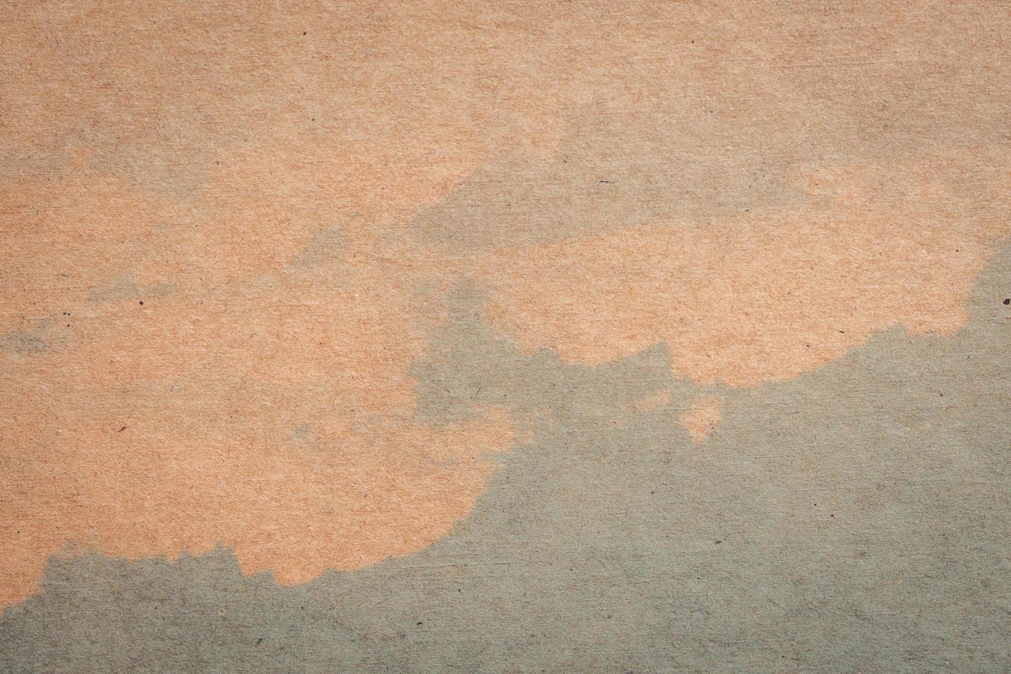 brown paper and blue water colour texture and background with space. photo