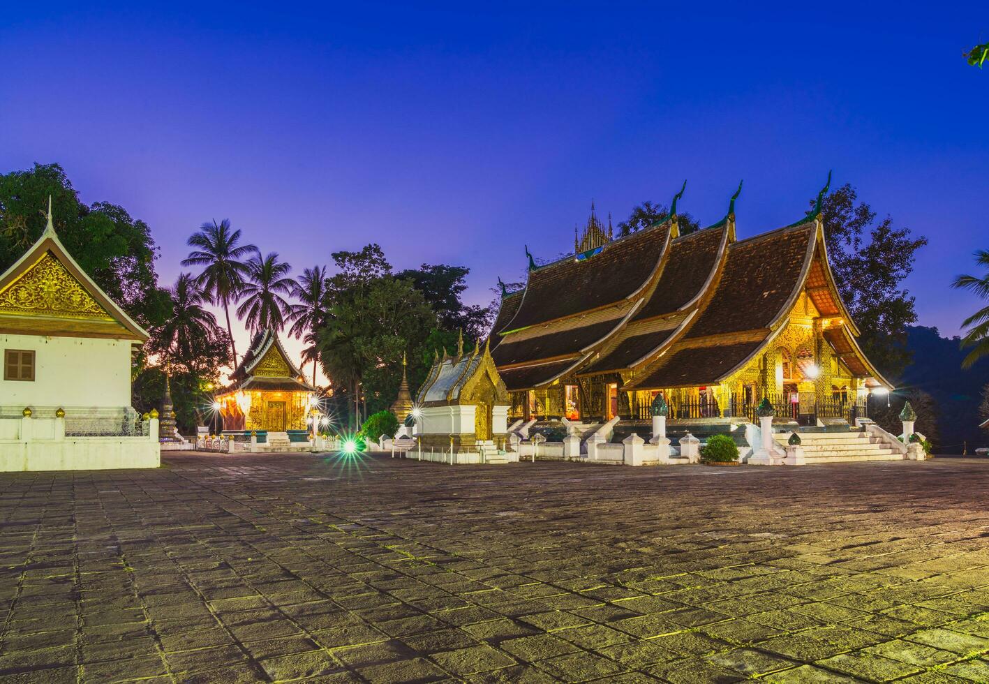 Wat Xieng Thong Golden City Temple in Luang Prabang, Laos. Xieng Thong temple is one of the most important of Lao monasteries. photo
