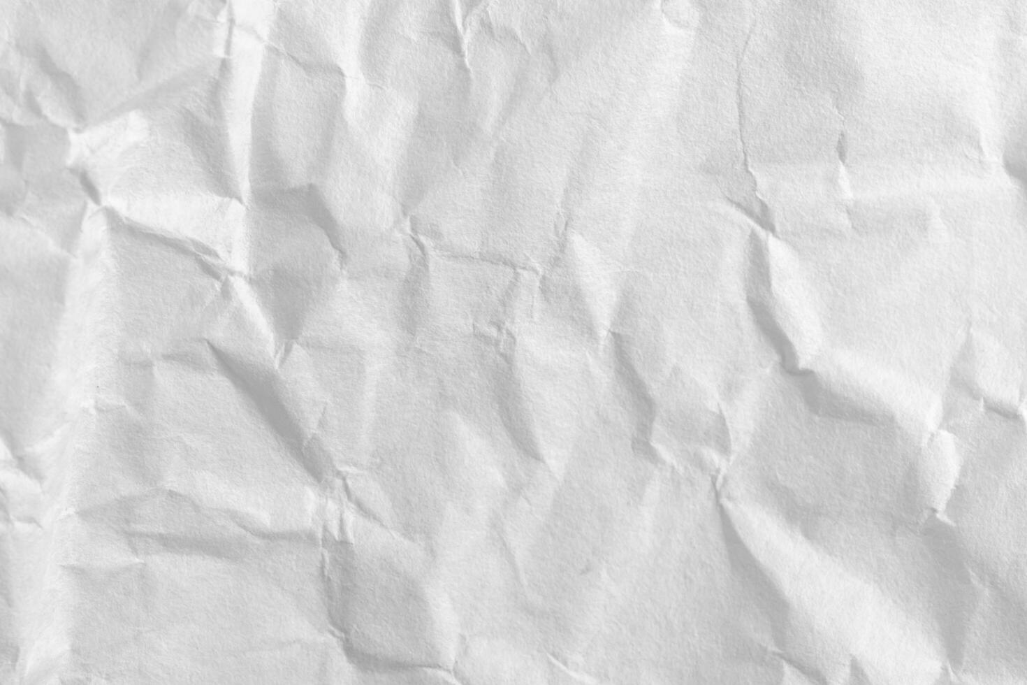 close up crumpled white paper texture and background photo