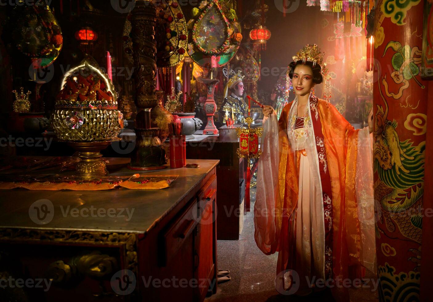 Portrait of a Chinese woman with a hand lantern In sacred shrines or temples, And in Chinese where hand lamp mean good luck and happiness photo