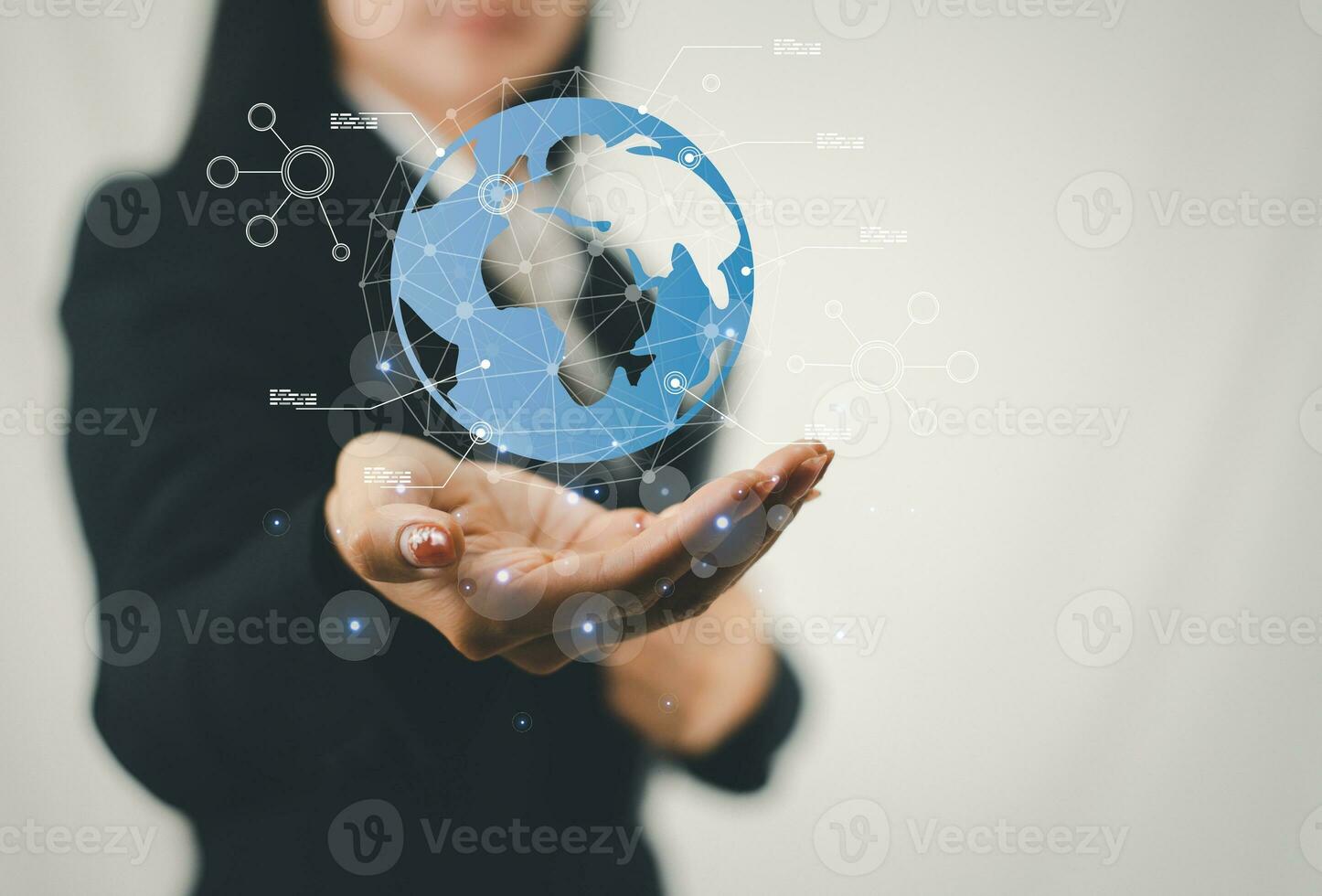 Close up of businesswoman hand pointing at glowing forex chart trading interface on blurry blue bokeh background. Market, economy and data exchange concept. Double exposure photo