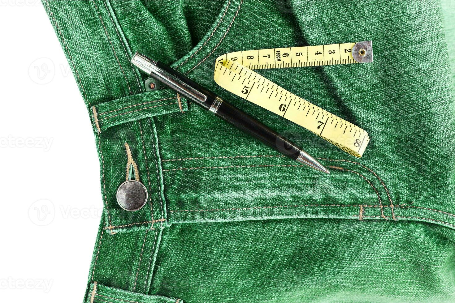 Jeans and measuring tape photo