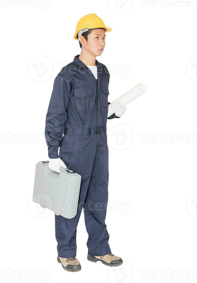 Young handyman  standing with his tool box photo