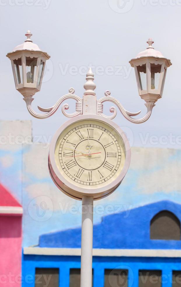 An antique but classic vintage clock lamp displayed in a landmark that serves as a tourist attraction for tourists to take photos as a souvenir of their journey.