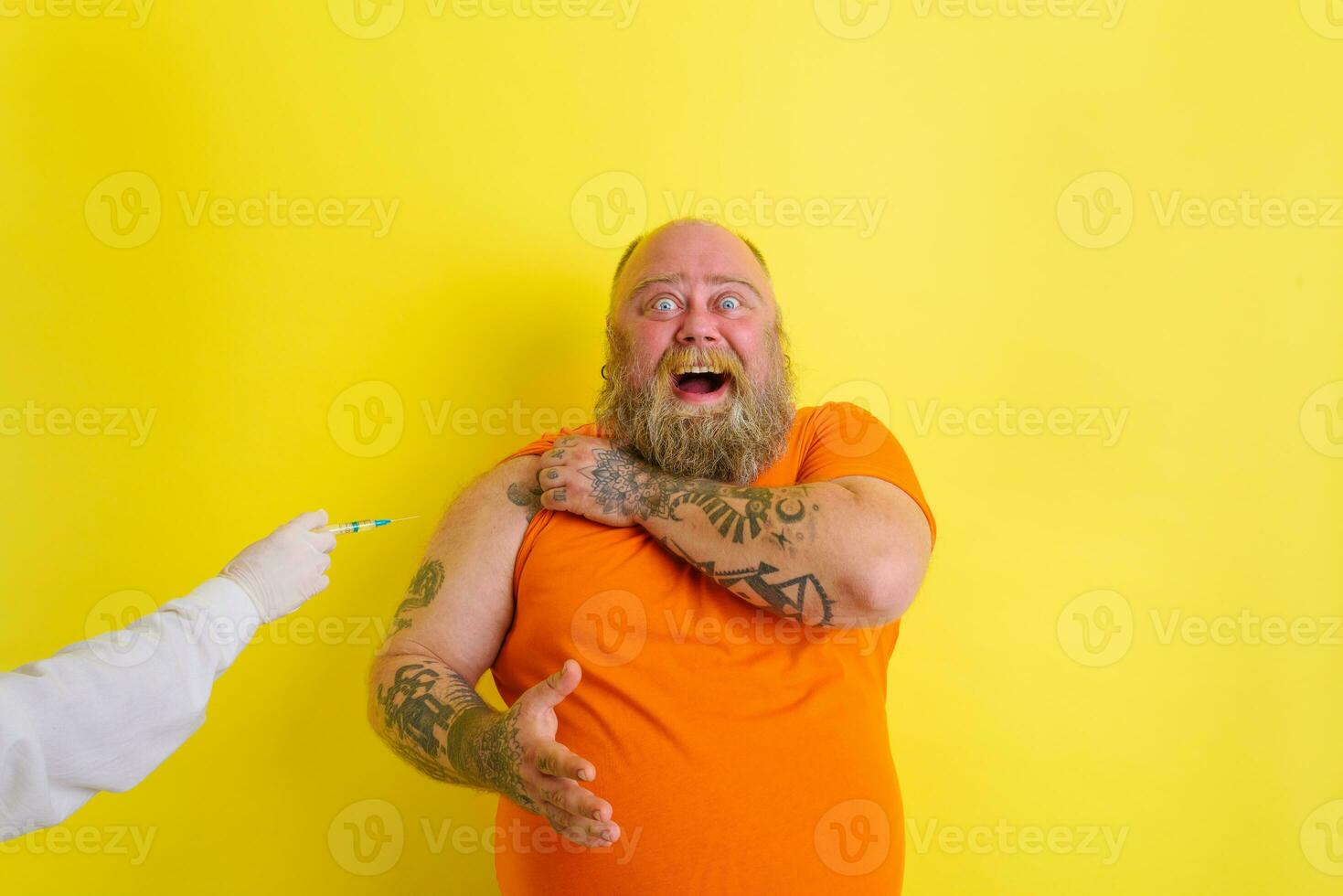 Happy man is happy of getting the covid-19 vaccine photo