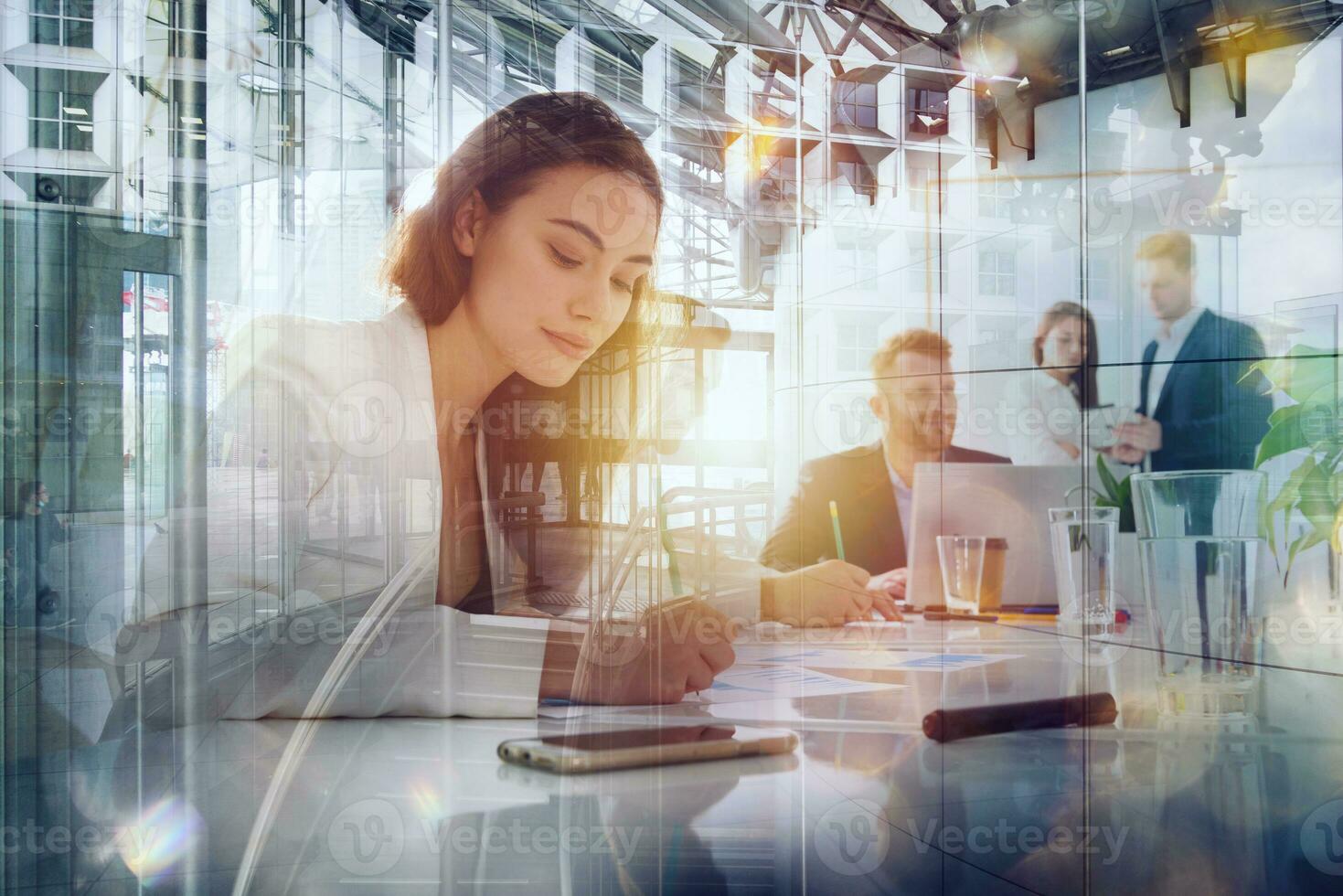 Business people in office work together during a meeting photo