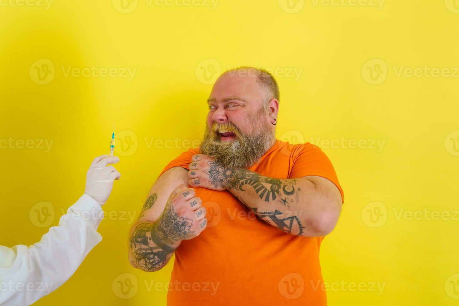 Happy man is happy of getting the covid-19 vaccine photo