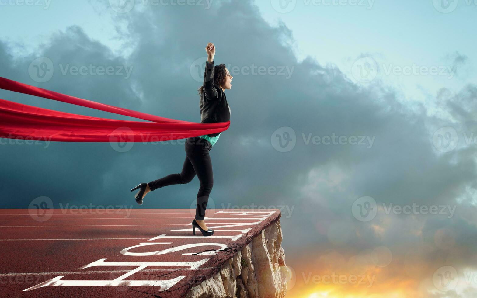 Businesswoman thinks she has won but there is a precipe after the finishline photo