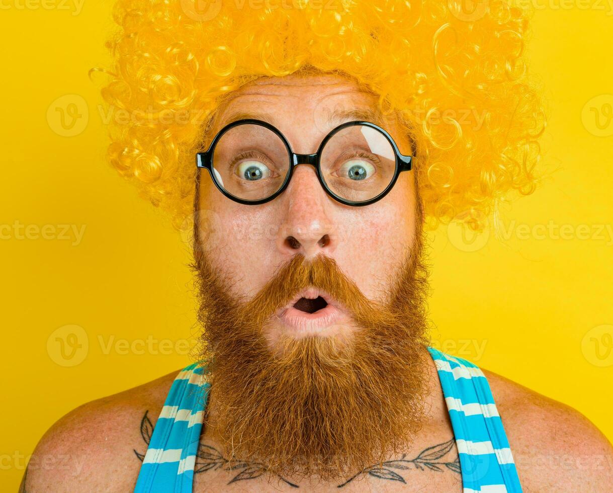 man with yellow beard,wig and glasses photo