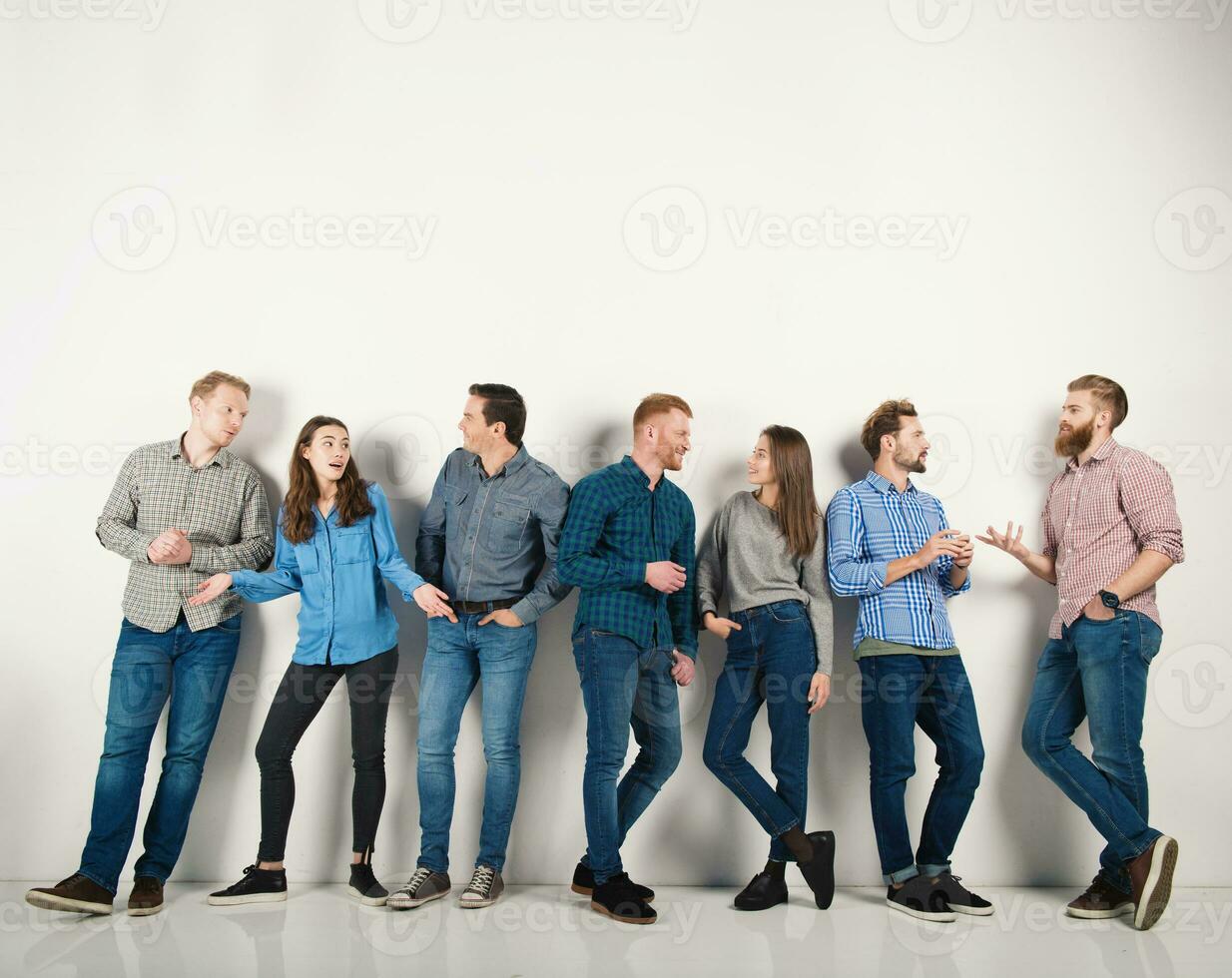 Group of boys and girls speak talking to each other. Concept of social people photo