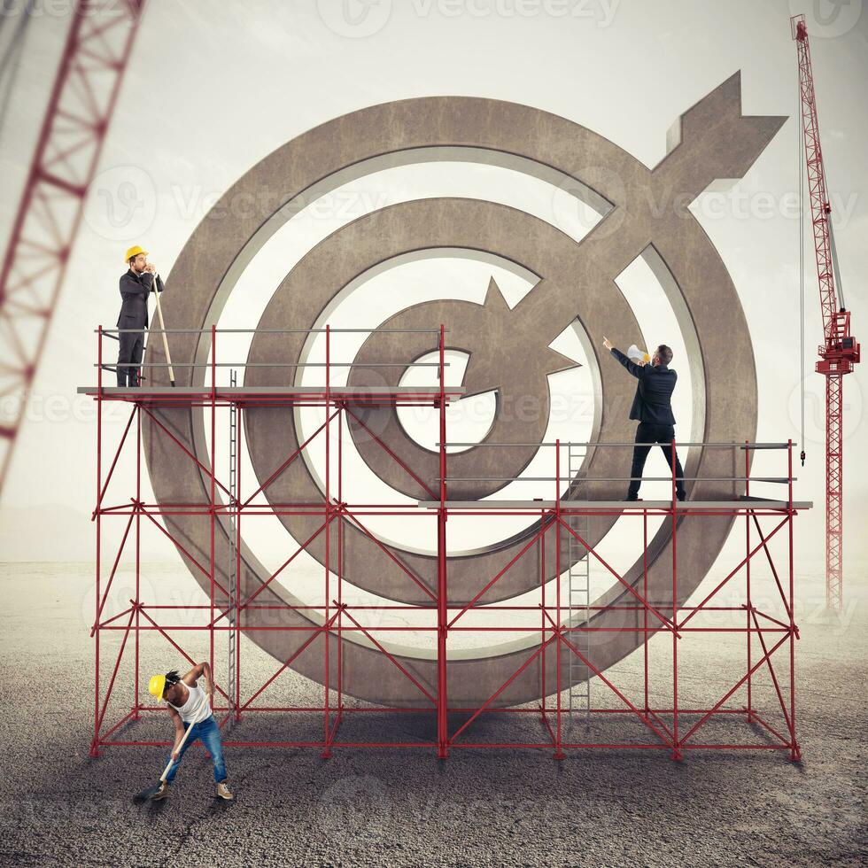 Teamwork build a business target . Mixed media photo