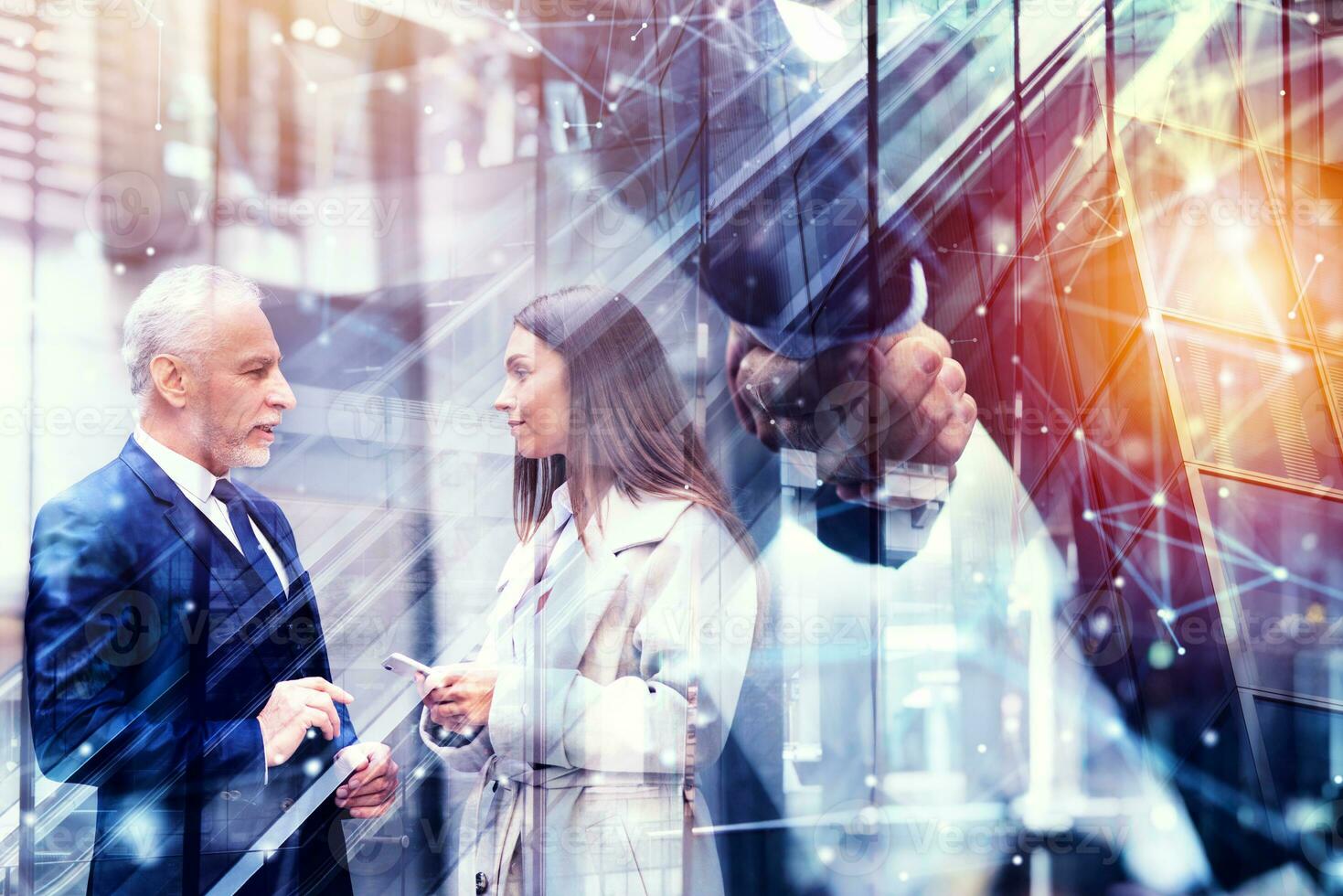 Handshaking business person in office. concept of teamwork and partnership. Double exposure photo