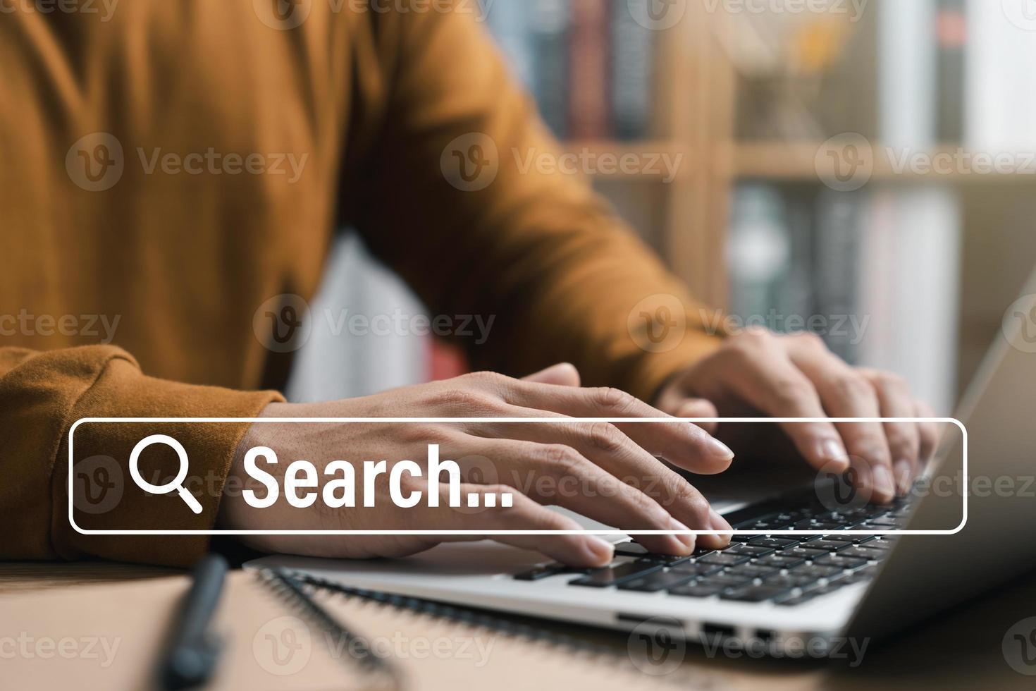 Searching Browsing Internet Data Information with blank search bar.businessman working with laptop computer on desk in office. Networking Concept. photo