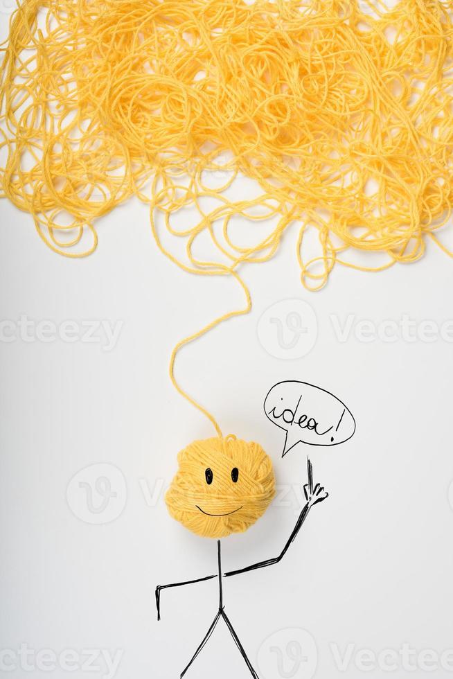 Concept of idea and innovation with tangle of wool yarn photo