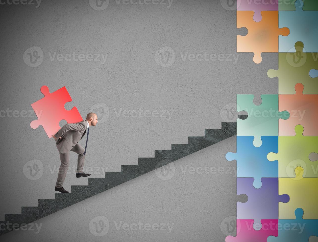 Missing piece of puzzle of a businessman build a new company photo