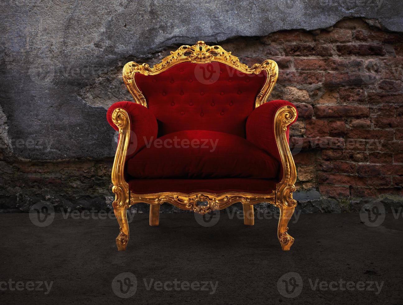 Red and gold luxury armchair into an old room photo