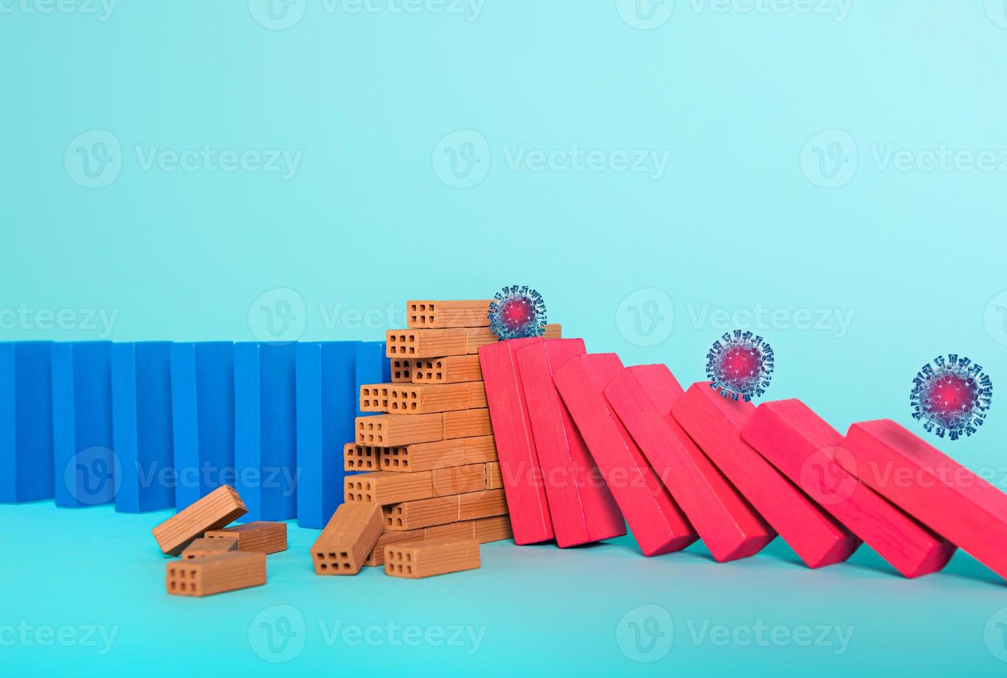 Concept of covid19 coronavirus pandemic with falling chain like a domino game. Contagion and infection progression stopped by a wall of brick. Cyan background photo