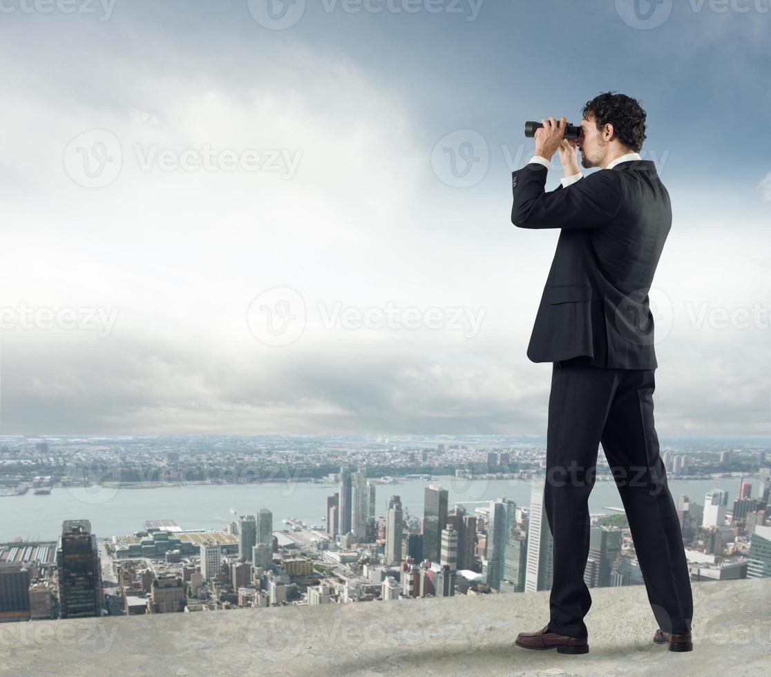 Businessman looking to the future photo