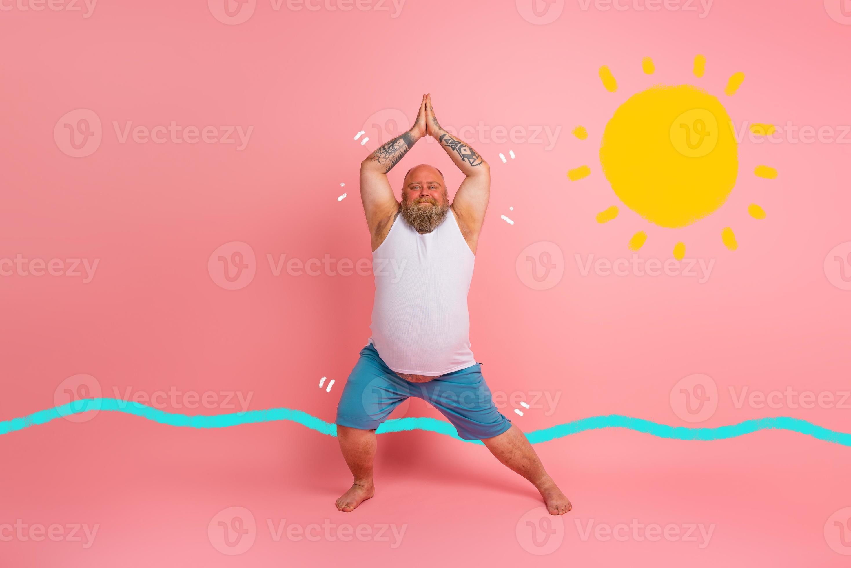 Funny man with beard in yoga position on studio pink background 20688646  Stock Photo at Vecteezy