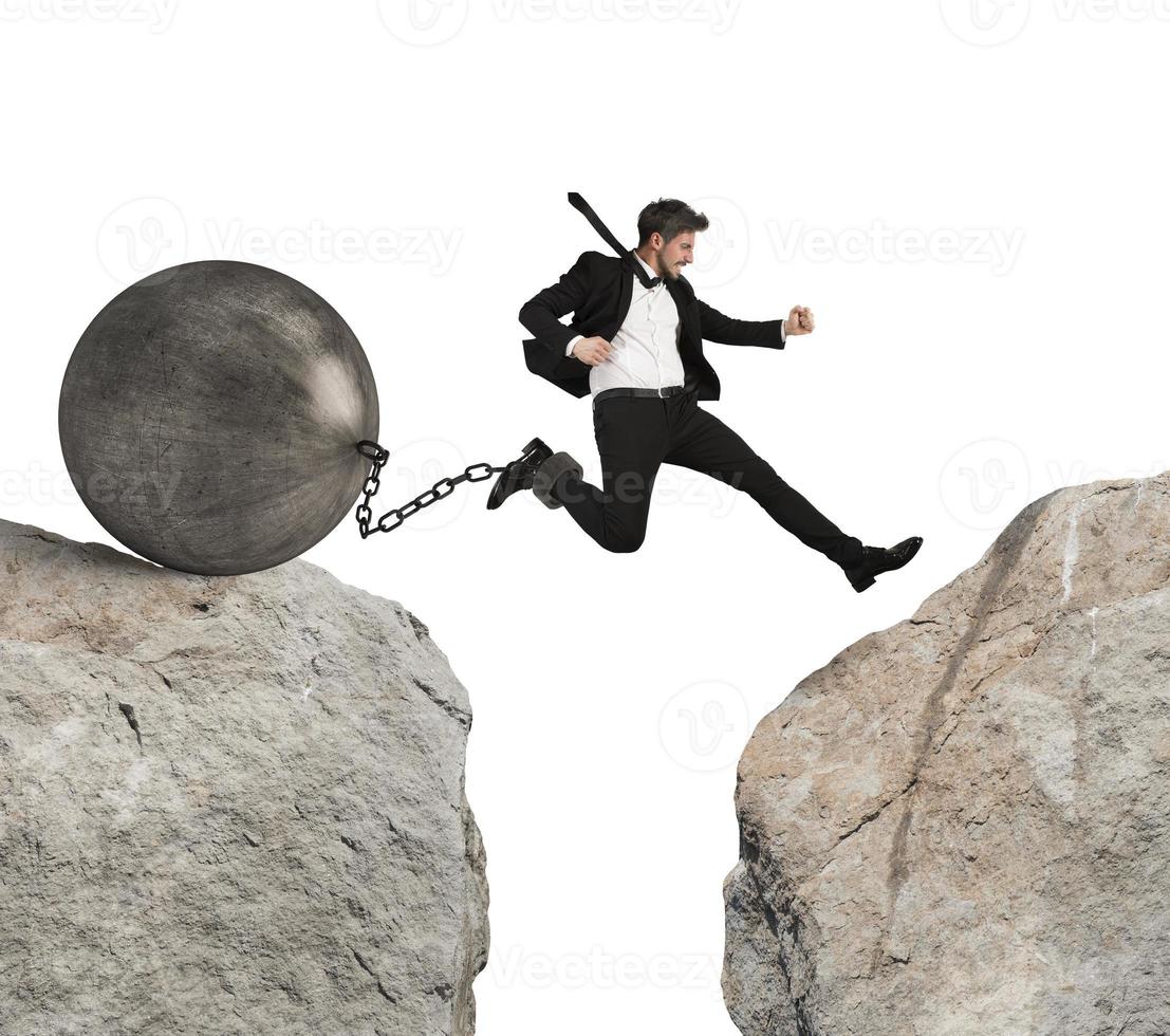Businessman overcomes obstacles photo