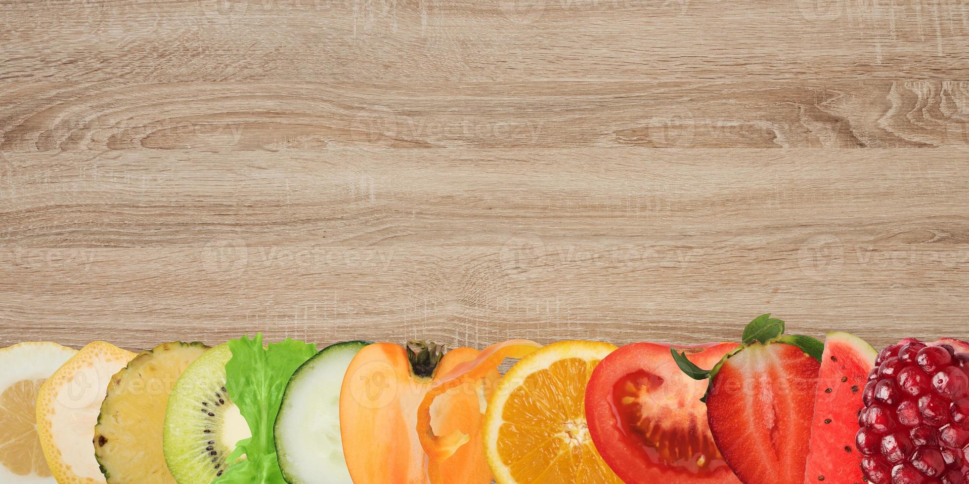 Fruit banner on wood background photo