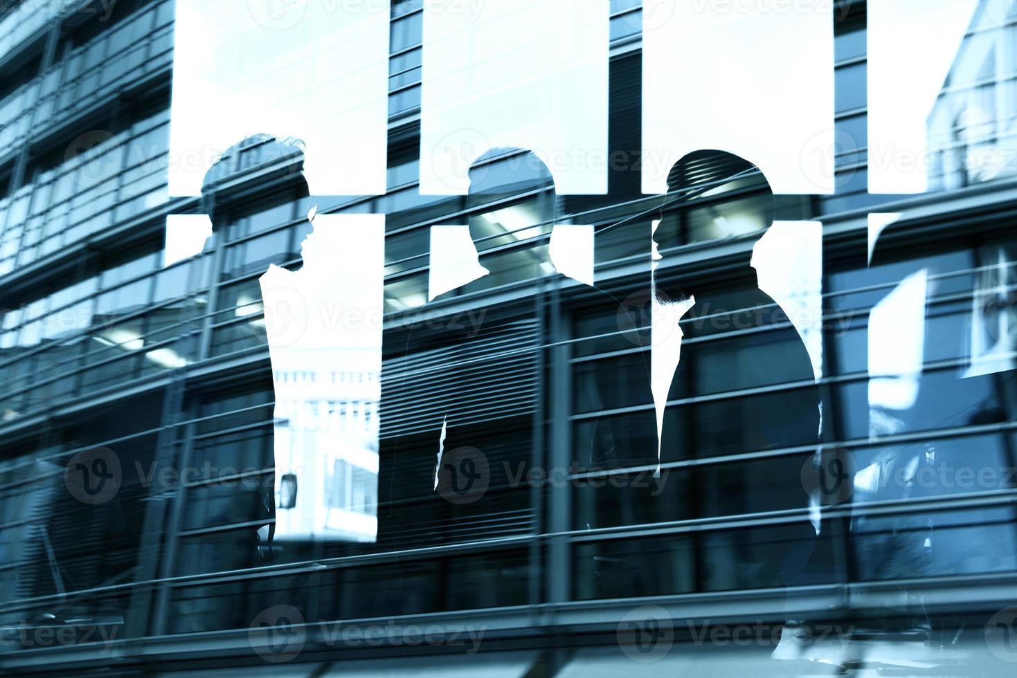 Businessmen that work together in office. Concept of teamwork, partnership and startup. double exposure photo