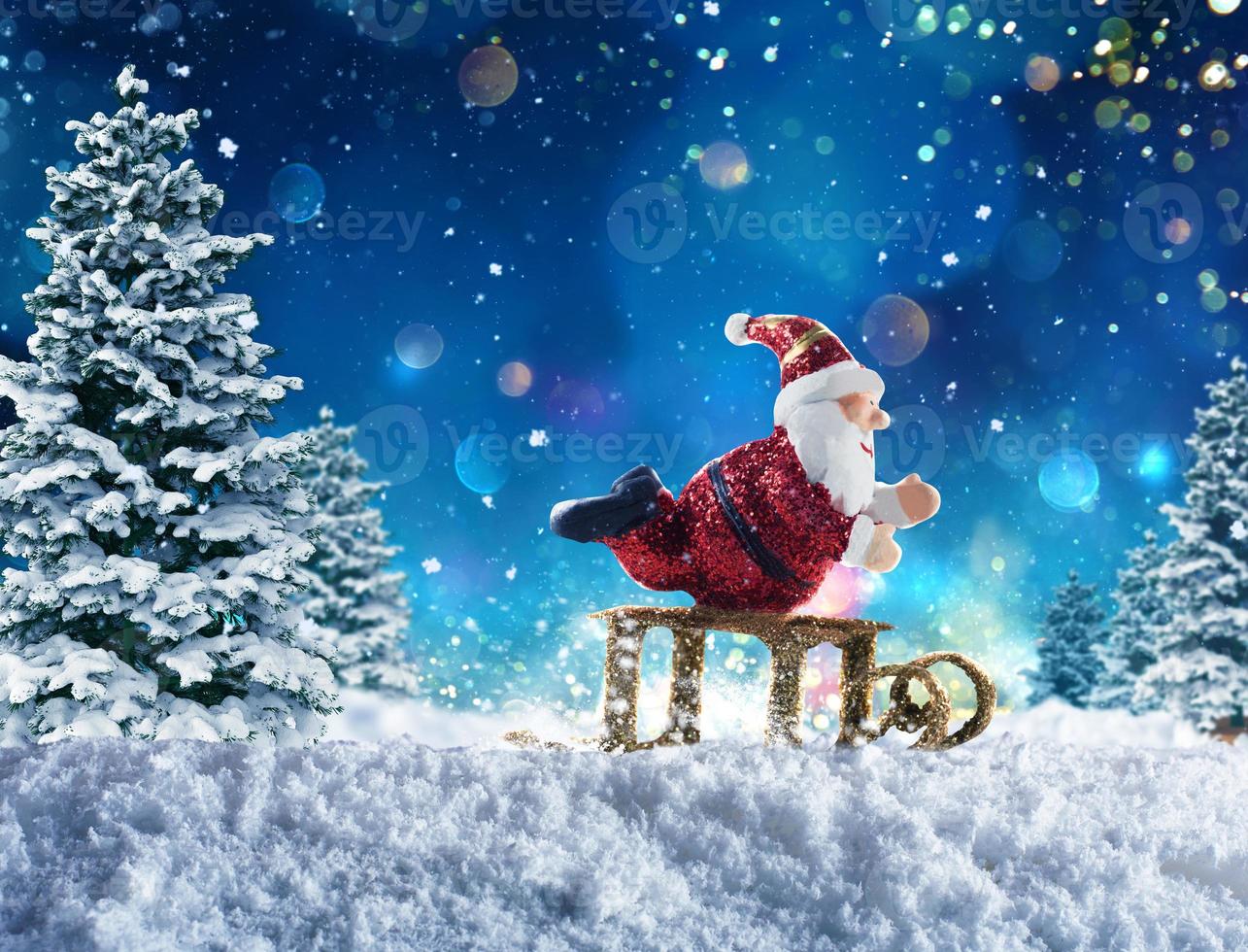 Puppet Santa Claus on snow photo