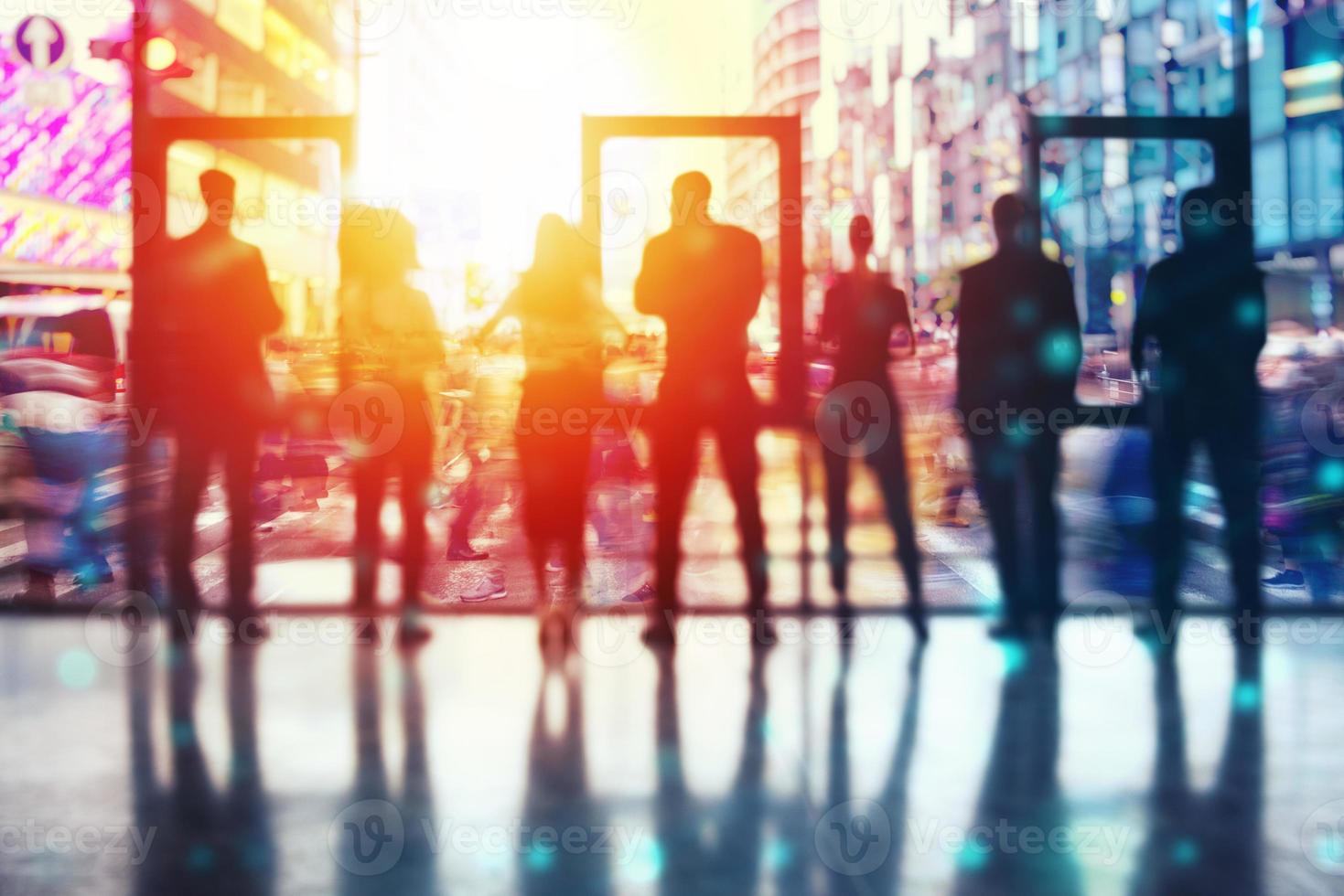 Concept background with business people silhouette looking out of the window. Double exposure photo