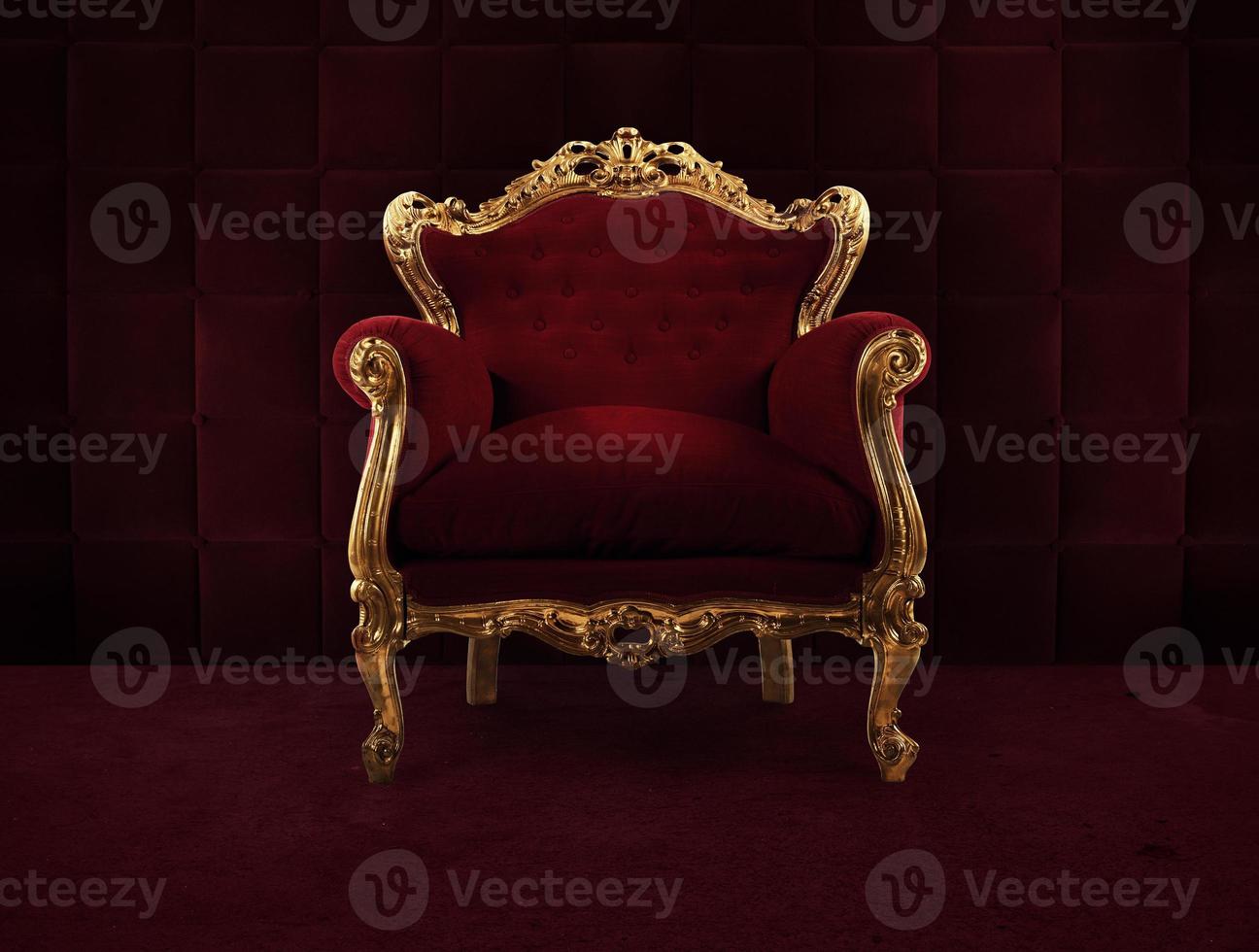 Red and gold luxury armchair into an old room photo