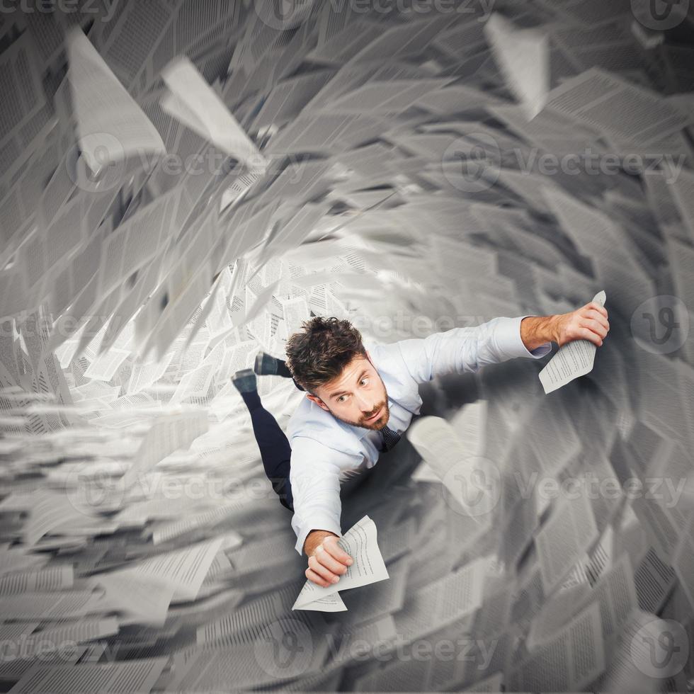 Businessman is going to fall photo